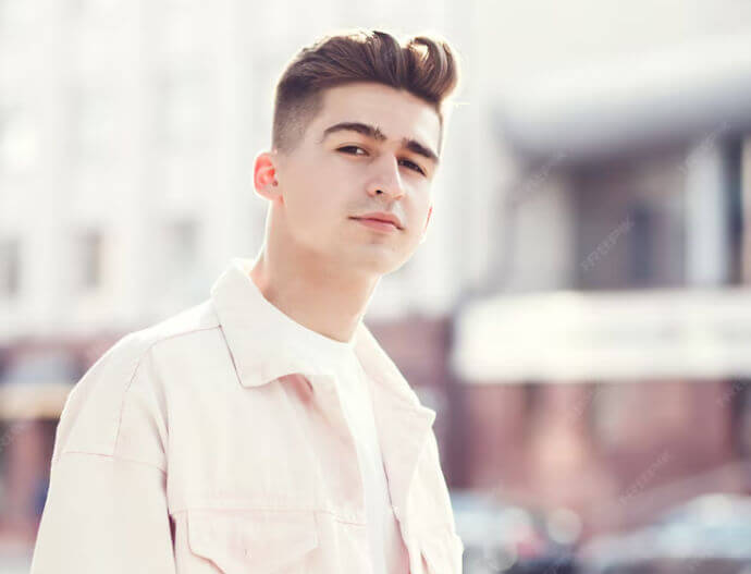 Young Indian gay boy smiling