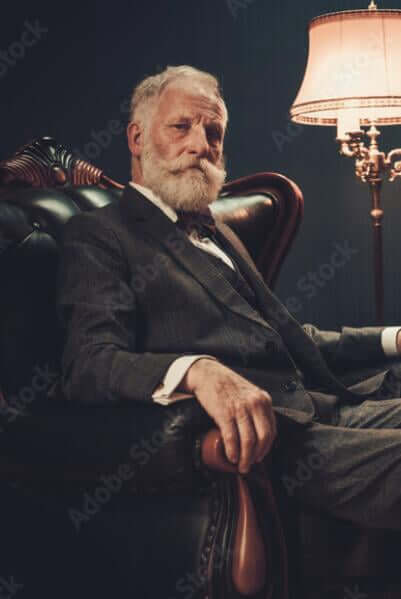 Indian gay daddy smiling in casual outfit